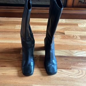 Hardly worn black leather boots.